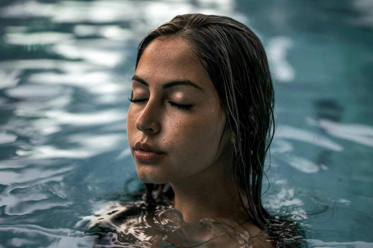 a woman relaxing while partaking in aquatic therapy for addiction recovery